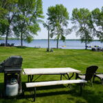 Gas grill, picnic table, & seating included